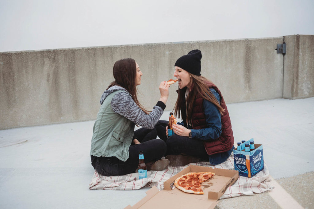 Casual rooftop engagement session with pizza and beer | Samantha Mitchell Photography | Featured on Equally Wed, the leading LGBTQ+ wedding magazine