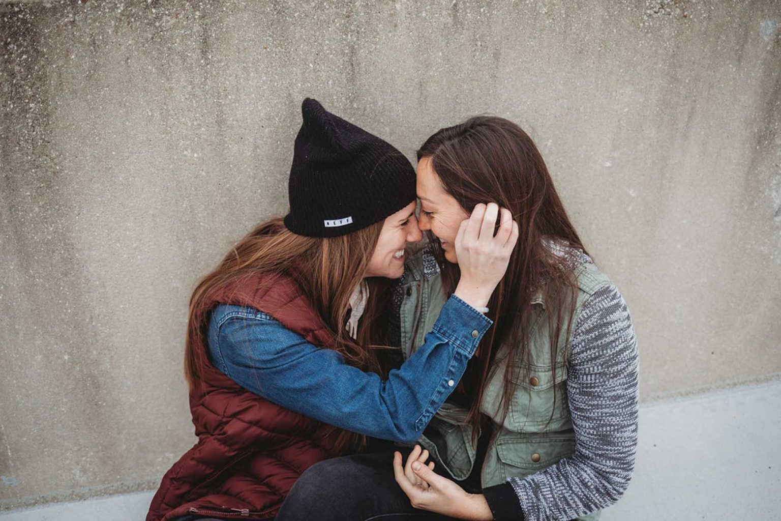 Casual rooftop engagement session with pizza and beer