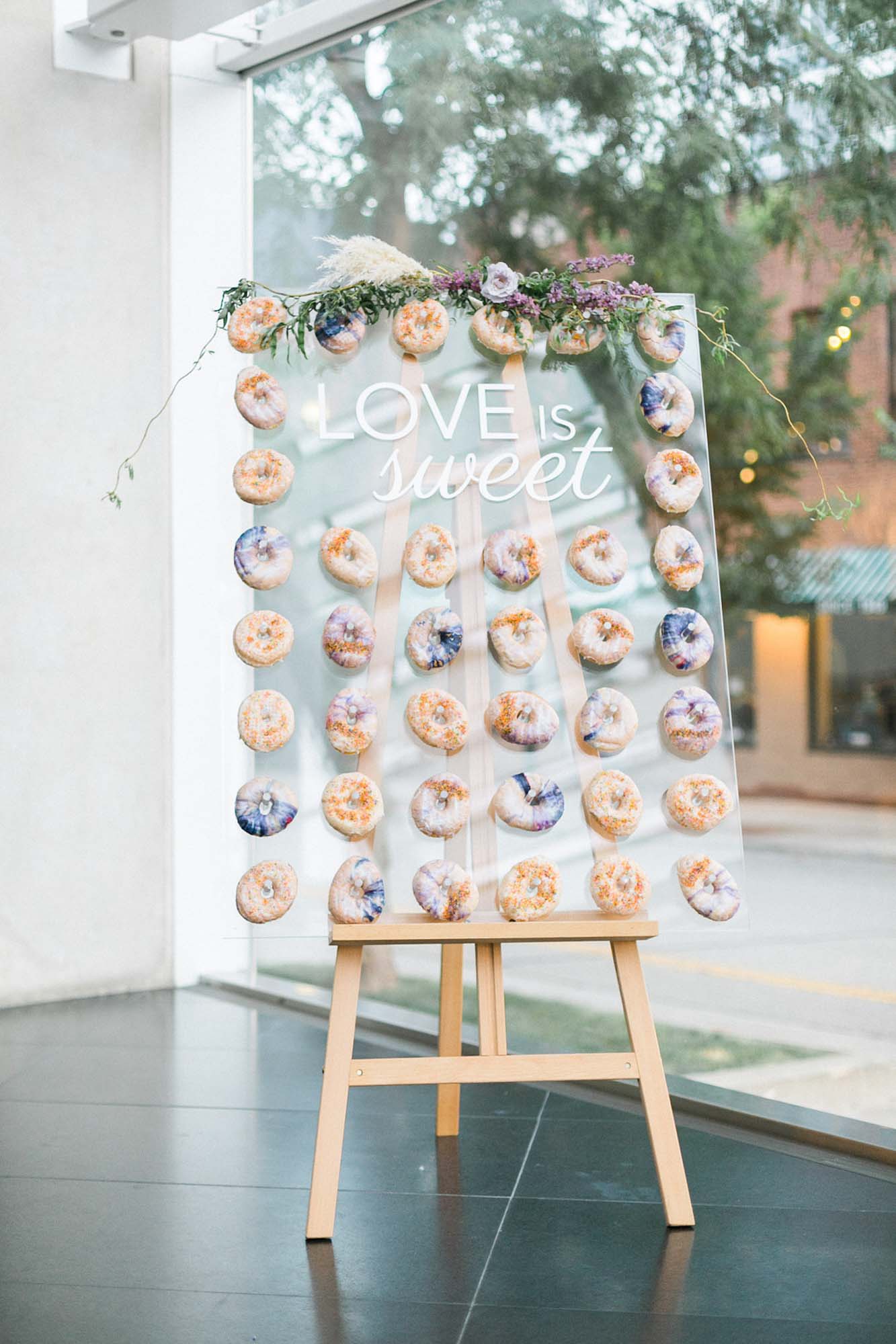 Elegant and eclectic wedding inspiration with gorgeous pops of purple | Laurelyn Savannah Photography | Featured on Equally Wed, the leading LGBTQ+ wedding magazine