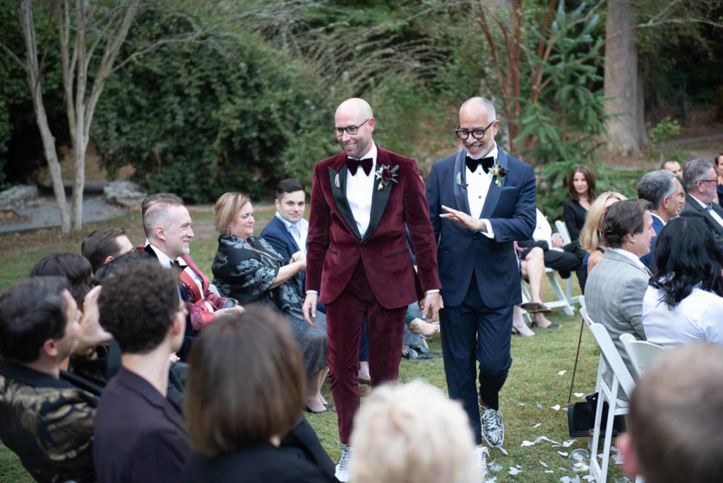 Glamorous garden wedding with bespoke tuxedos and spiral seating | Chucky Foto | Featured on Equally Wed, the leading LGBTQ+ wedding magazine