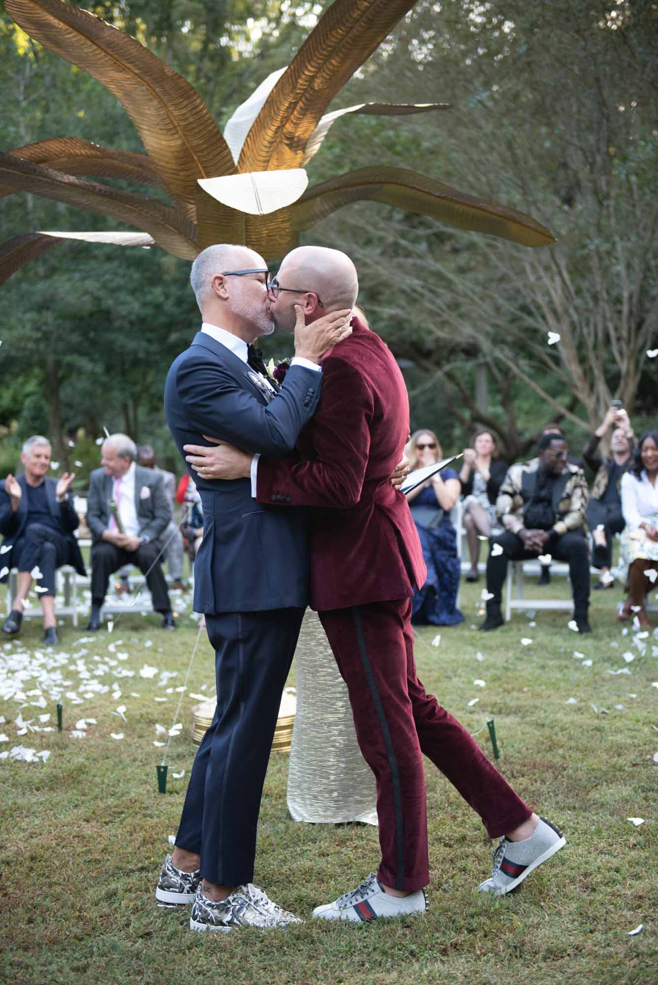 Glamorous garden wedding with bespoke tuxedos and spiral seating | Chucky Foto | Featured on Equally Wed, the leading LGBTQ+ wedding magazine