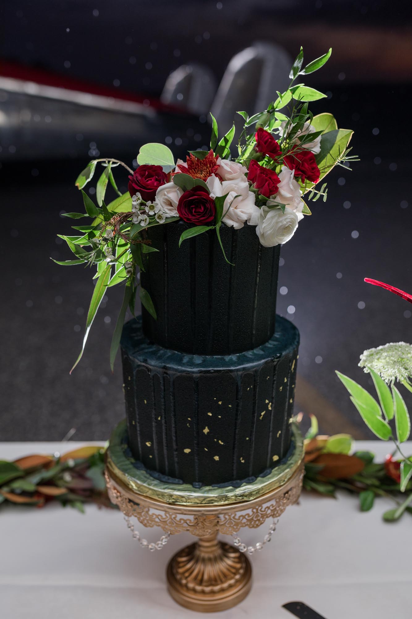 Travel-themed wedding ideas + a glam black wedding cake | Tabitha Baldwin | Featured on Equally Wed, the leading LGBTQ+ wedding magazine