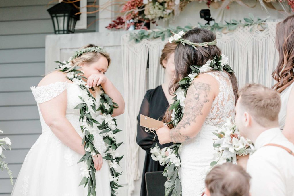 Backyard New Hampshire wedding with white and pastel florals and a dog of honor | Ali B Photography | Featured on Equally Wed, the leading LGBTQ+ wedding magazine