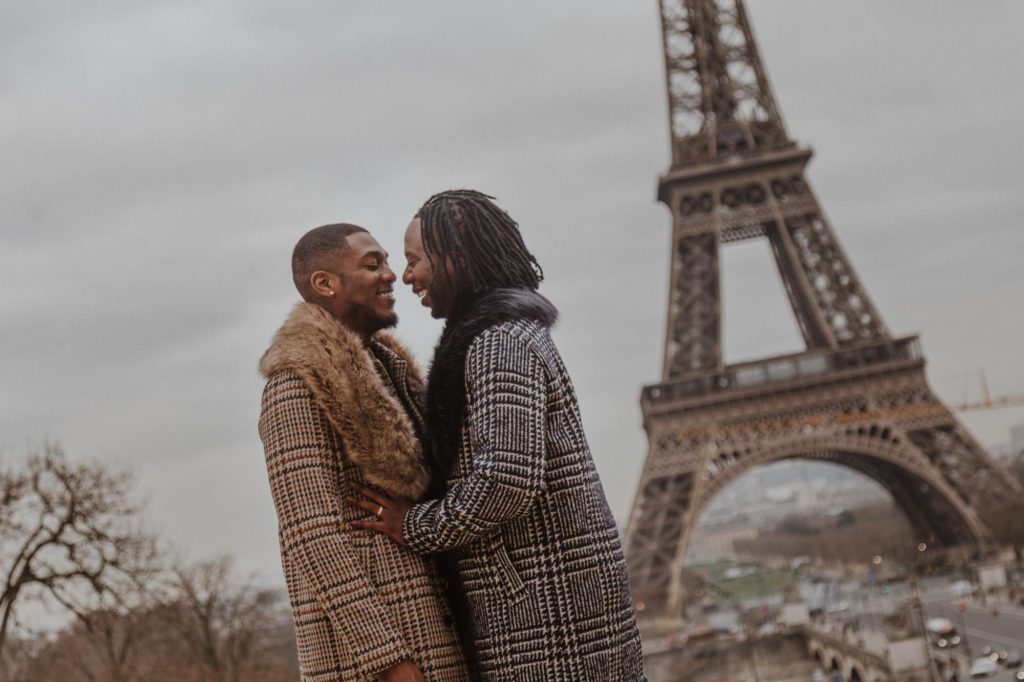 Breathtaking Eiffel Tower engagement session with fabulous fur scarves | Février Photography | Featured on Equally Wed, the leading LGBTQ+ wedding magazine