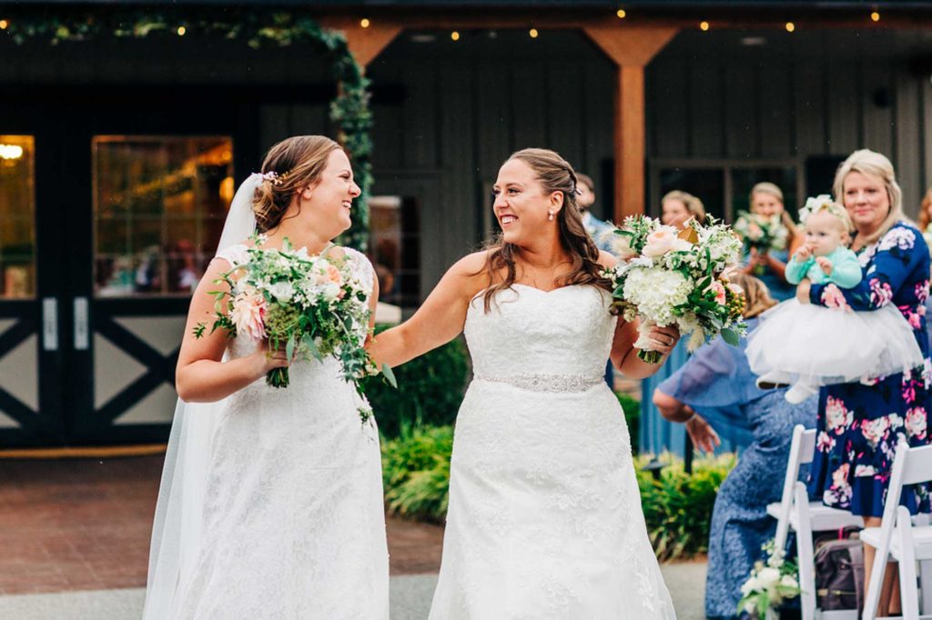North Carolina stable wedding after romantic ferry proposal | Yessica Grace Photography | Featured on Equally Wed, the leading LGBTQ+ wedding magazine