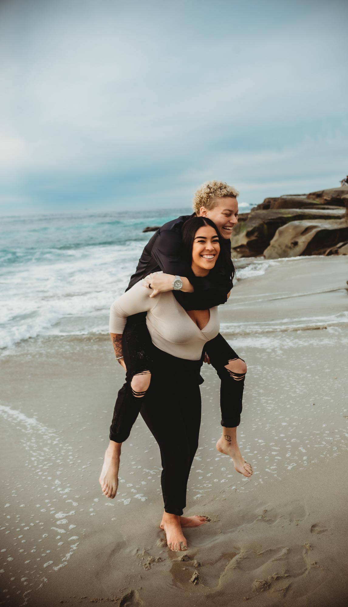 Romantic beach photo shoot to celebrate whirlwind engagement and wedding | Brittany V Photography | Featured on Equally Wed, the leading LGBTQ+ wedding magazine