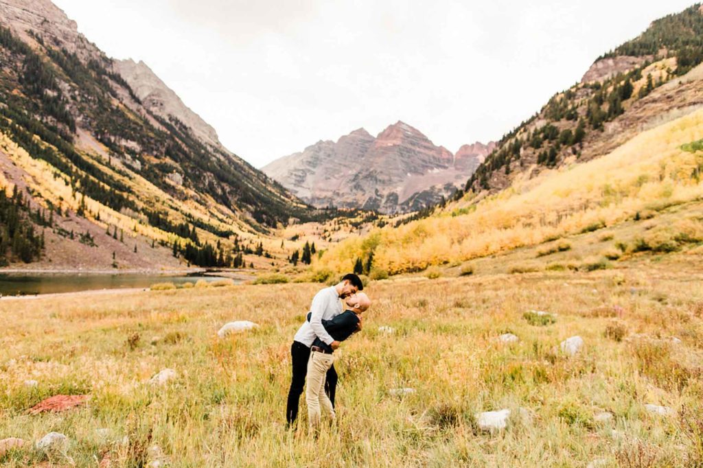 Breathtaking fall proposal at Colorado's iconic Maroon Bells | Sheena Shahangian Photography | Featured on Equally Wed, the leading LGBTQ+ wedding magazine