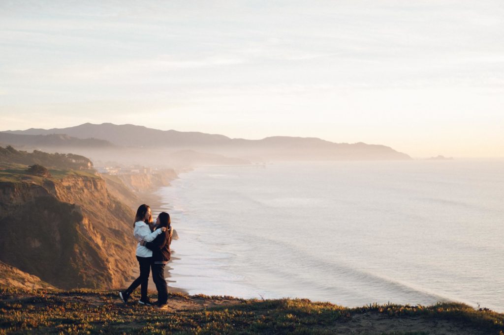 Magnificent engagement session by the water at California's Mussel Rock Park | Zandbox Photography | Featured on Equally Wed, the leading LGBTQ+ wedding magazine