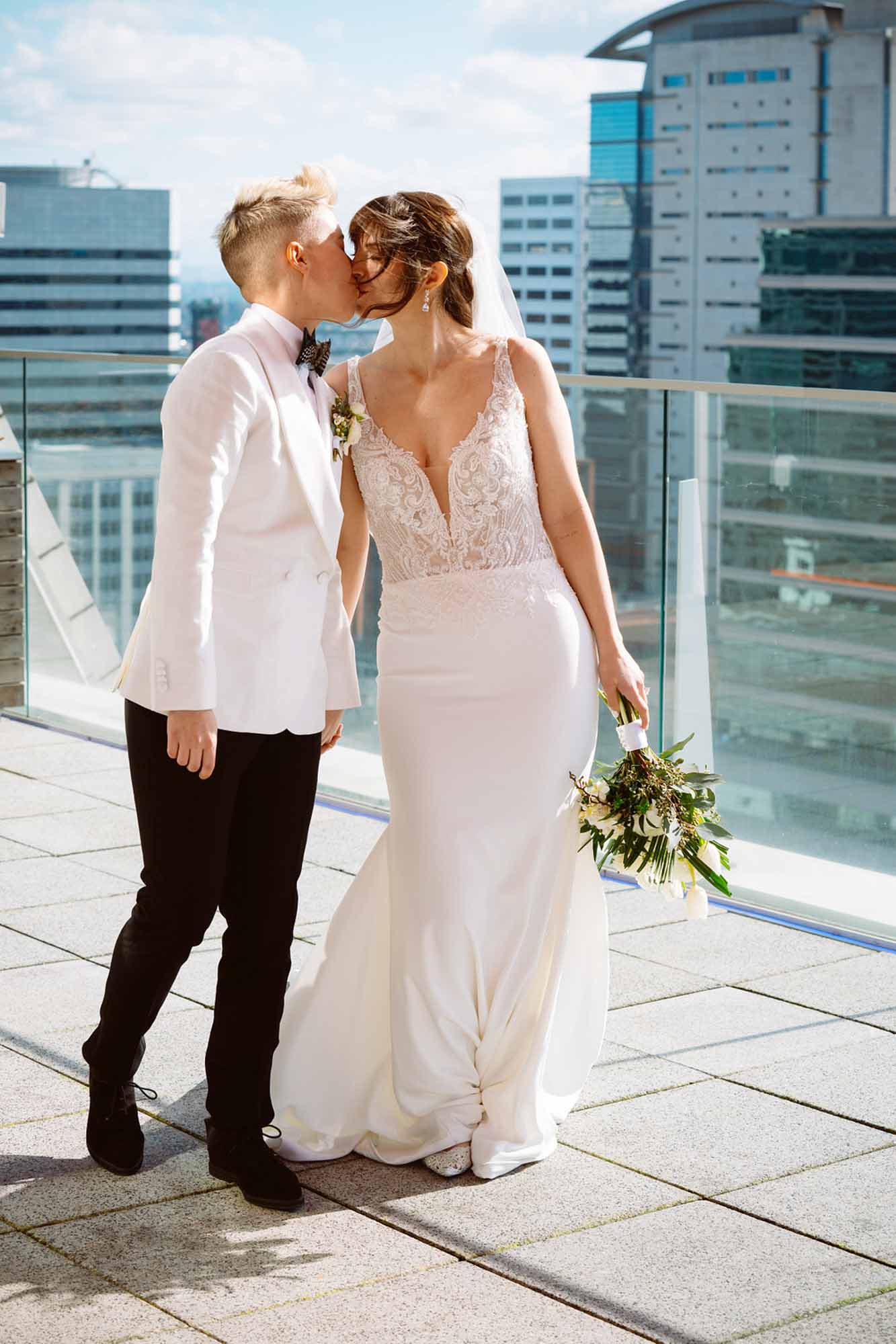Portland elopement inspiration with city views, white florals and puppy love | Jessica Hill Photography | Featured on Equally Wed, the leading LGBTQ+ wedding magazine