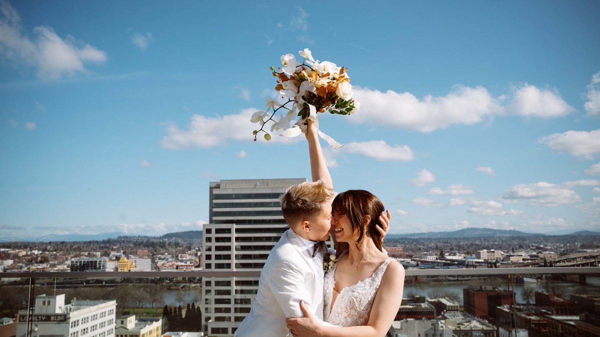 Portland elopement inspiration with city views, white florals and puppy love