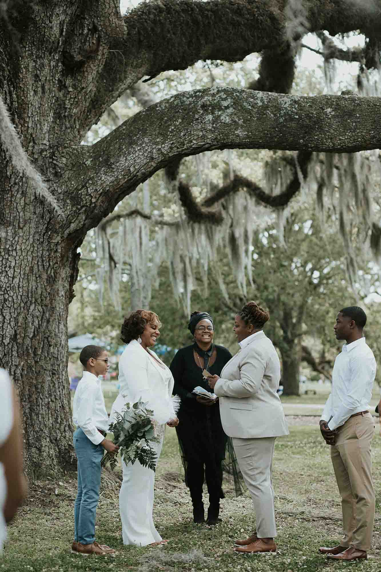 Romantic spring elopement beneath the oak trees of City Park in New Orleans | Olivia Yuen Photography | Featured on Equally Wed, the leading LGBTQ+ wedding magazine