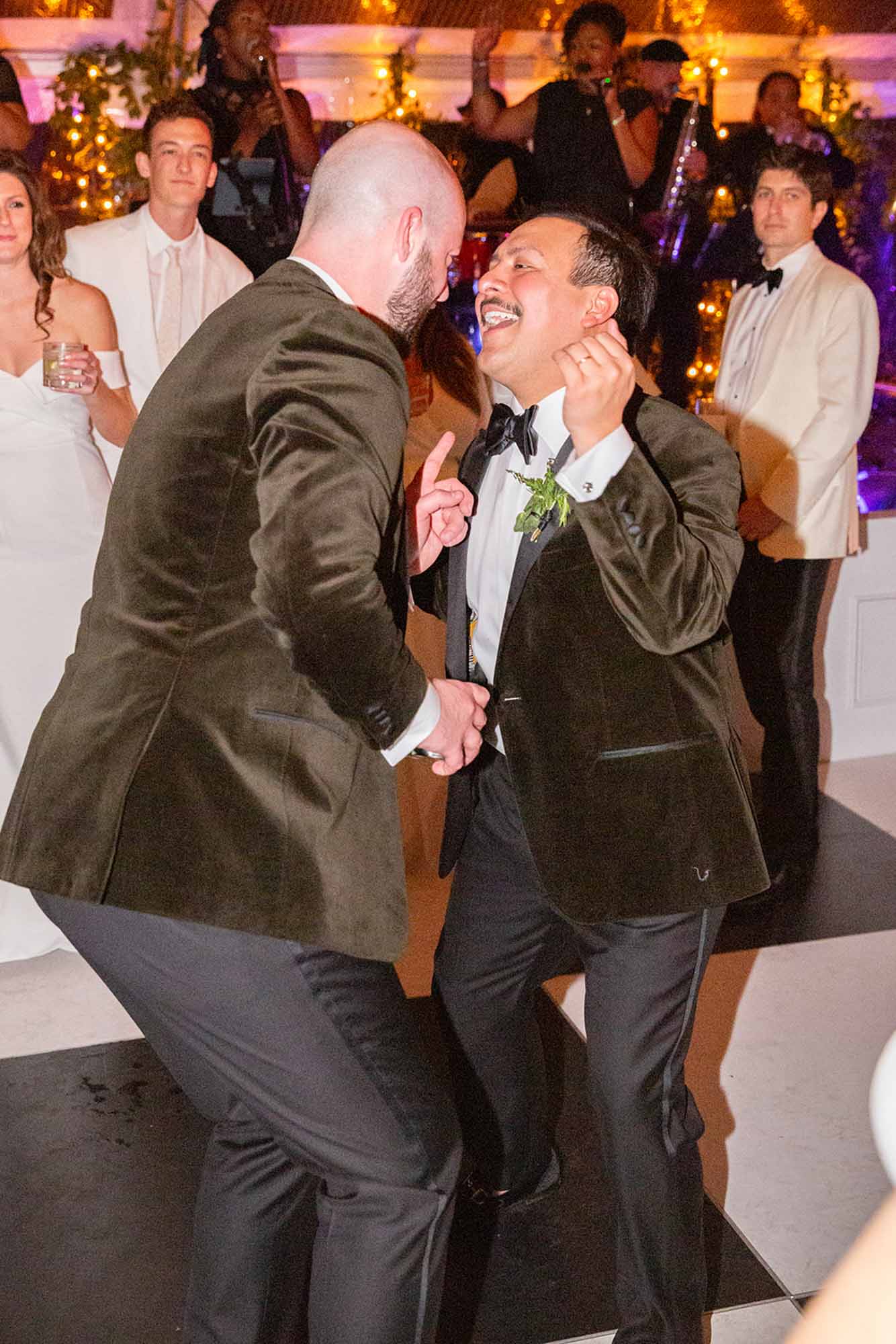 The guests wore white at this South Carolina wedding | Cameron Hinkle Photography | Featured on Equally Wed, the leading LGBTQ+ wedding magazine