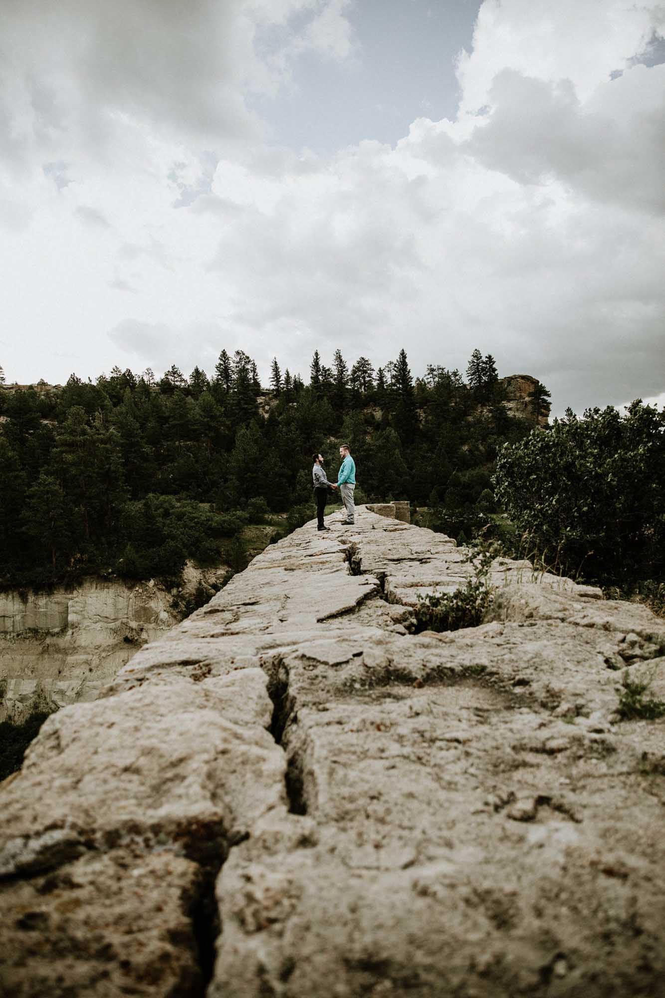 Touching engagement session amidst lush colorado greenery | Rachel Veltri Photography | Featured on Equally Wed, the leading LGBTQ+ wedding magazine
