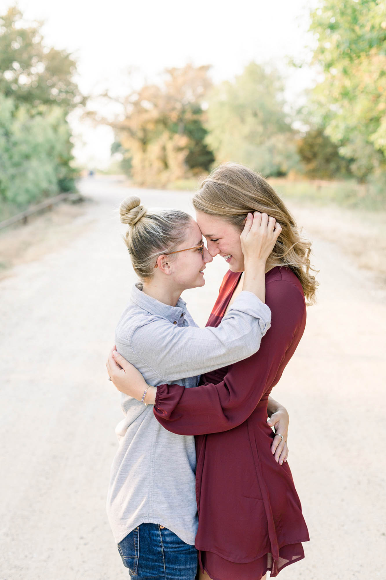 Autumn engagement session in Texas with joyful lake photos | Kimberly Harrell Photography | Featured on Equally Wed, the leading LGBTQ+ wedding magazine