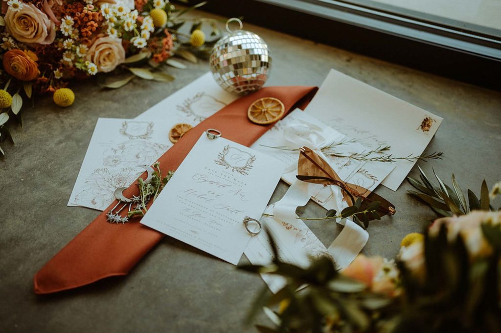 Boho grunge wedding inspiration with orange tones | The Rose Reflective | Featured on Equally Wed, the leading LGBTQ+ wedding magazine