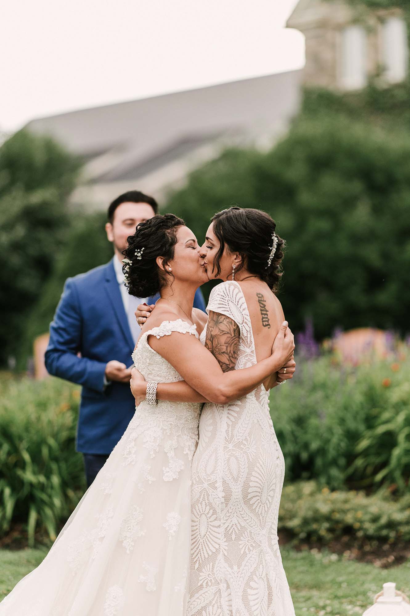 Enchanting Poconose wedding surrounded by lush greenery and waterfalls | The Fox and the Hare Photography | Featured on Equally Wed, the leading LGBTQ+ wedding magazine