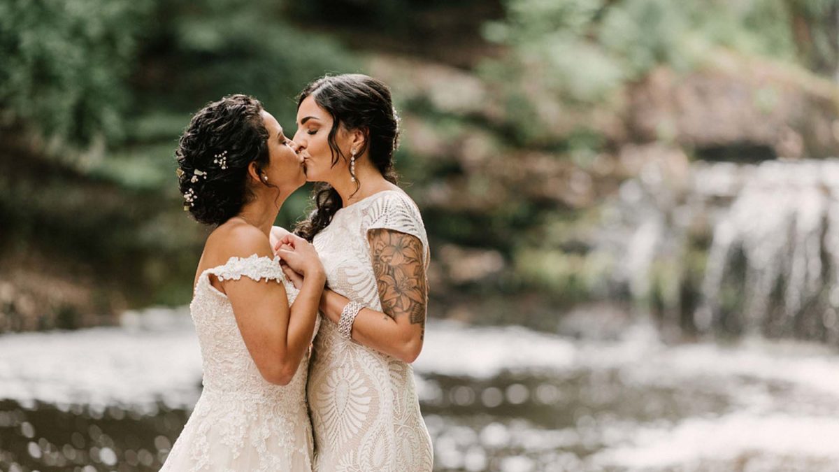 Enchanting Poconos wedding surrounded by lush greenery and waterfalls