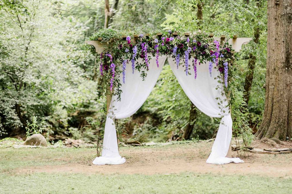 Outdoor South Carolina wedding with purple accents | Wyeth Augustine Photography | Featured on Equally Wed, the leading LGBTQ+ wedding magazine
