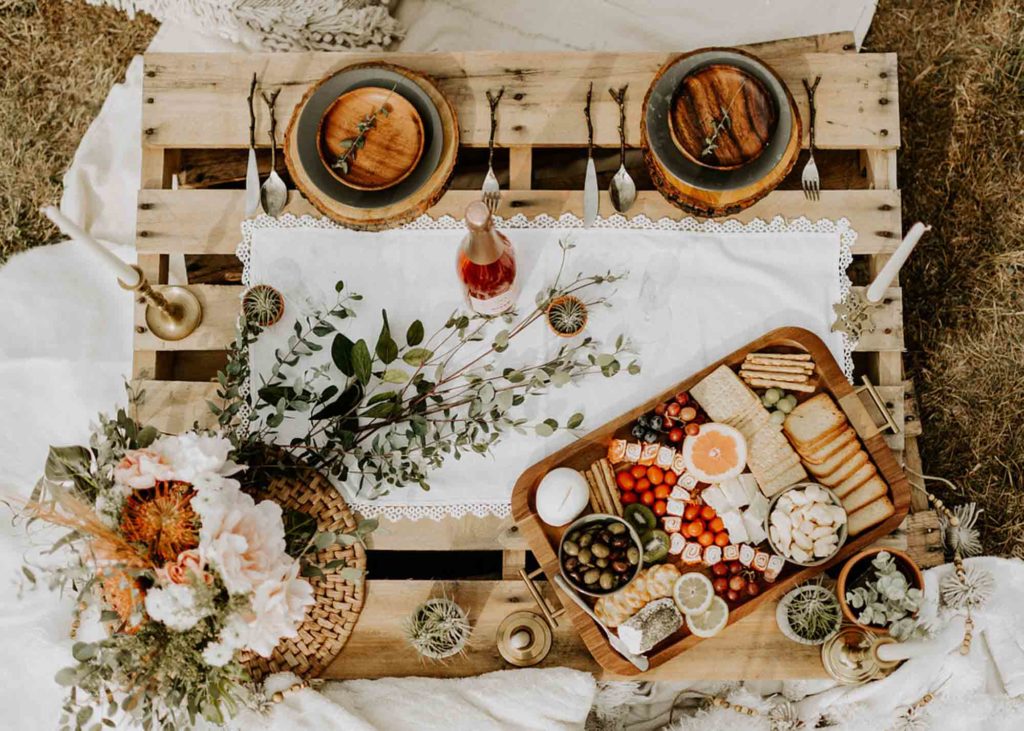 Romantic bohemian picnic photo session on the coast of Maine | Allie Kelley Photography | Featured on Equally Wed, the leading LGBTQ+ wedding magazine