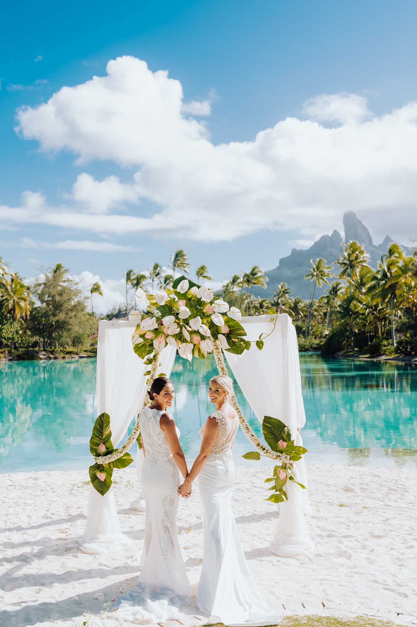 Stunning outdoor elopement on the island of Bora Bora | Marc Gérard Photography | Featured on Equally Wed, the leading LGBTQ+ wedding magazine