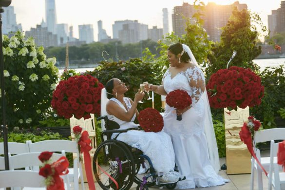 Sunset New York City wedding filled with red roses | Le Image | Featured on Equally Wed, the leading LGBTQ+ wedding magazine