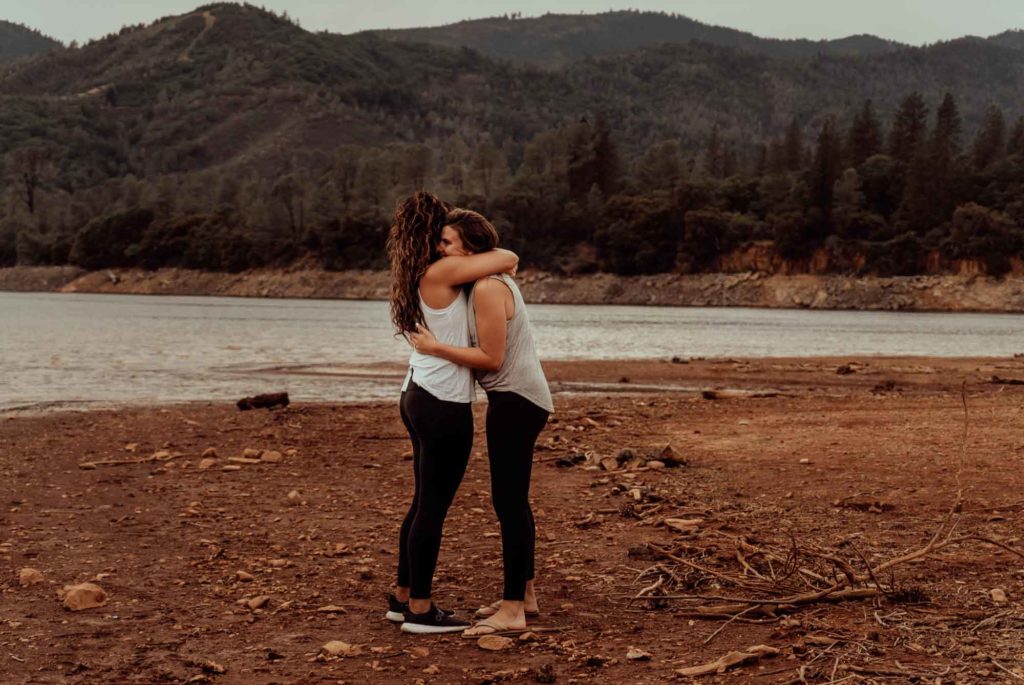 Sunset proposal on a camping trip at California's Shasta Lake | JCobb Photography | Featured on Equally Wed, the leading LGBTQ+ wedding magazine