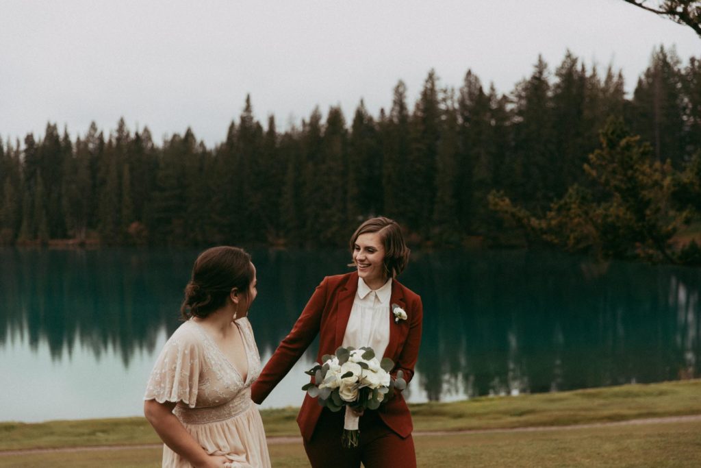 The rain only made this Canadian Rocky Mountain elopement more romantic | Brina Debalinhard Photography | Featured on Equally Wed, the leading LGBTQ+ wedding magazine
