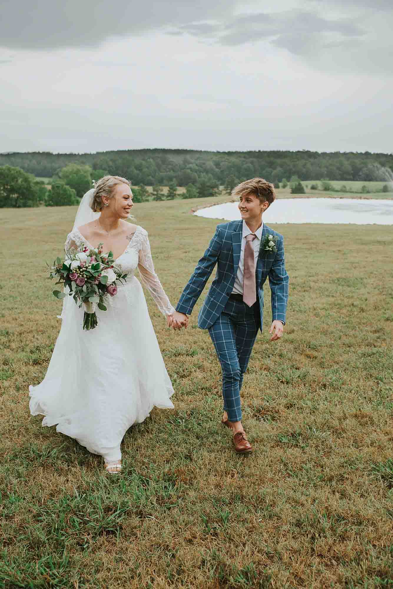 Waterside Georgia farm wedding with pink floral cake | Starglass Photography | Featured on Equally Wed, the leading LGBTQ+ wedding magazine