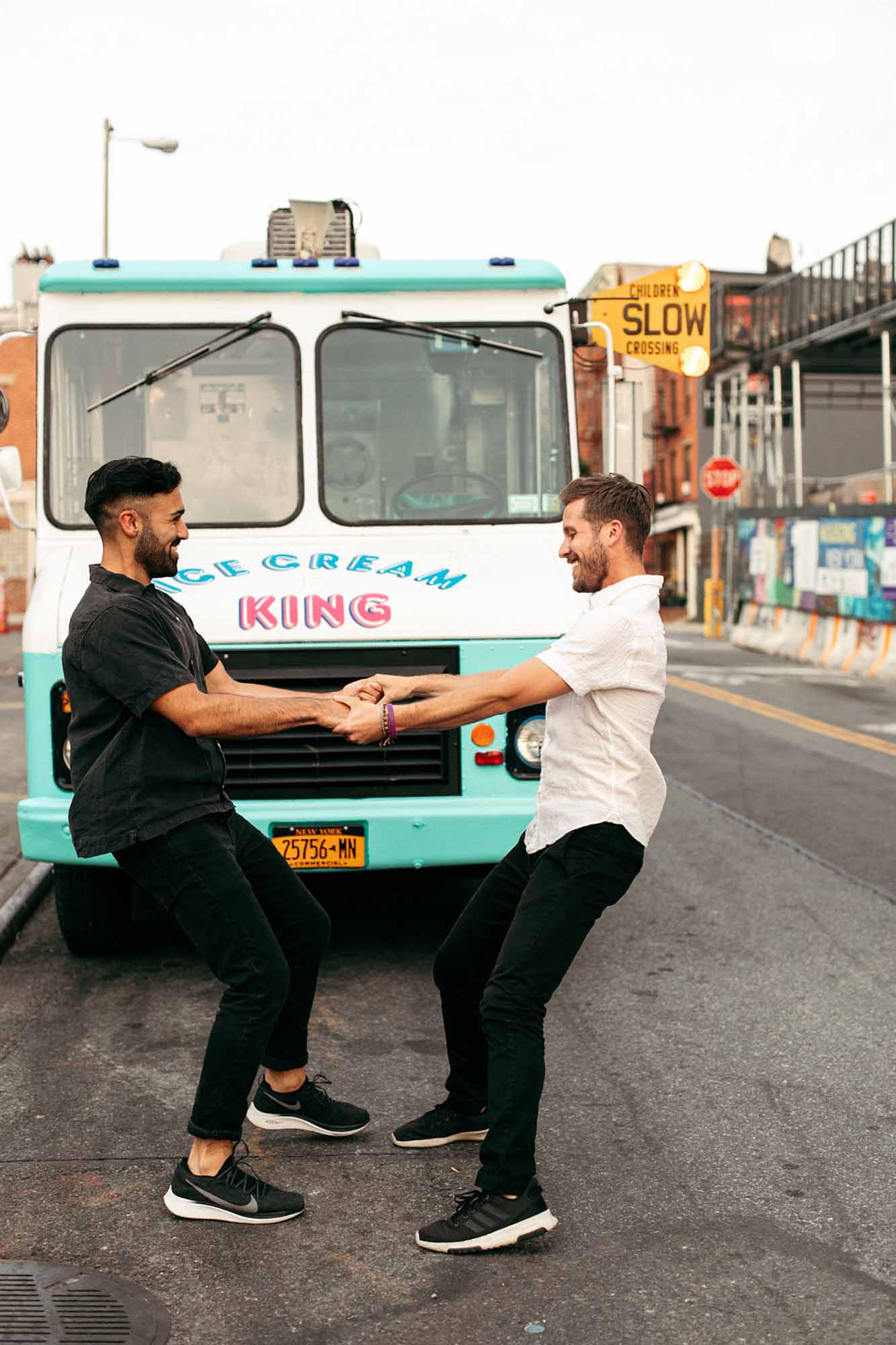 Charming urban engagement session in Brooklyn's Domino Park | Bailey Q Photo | Featured on Equally Wed, the leading LGBTQ+ wedding magazine