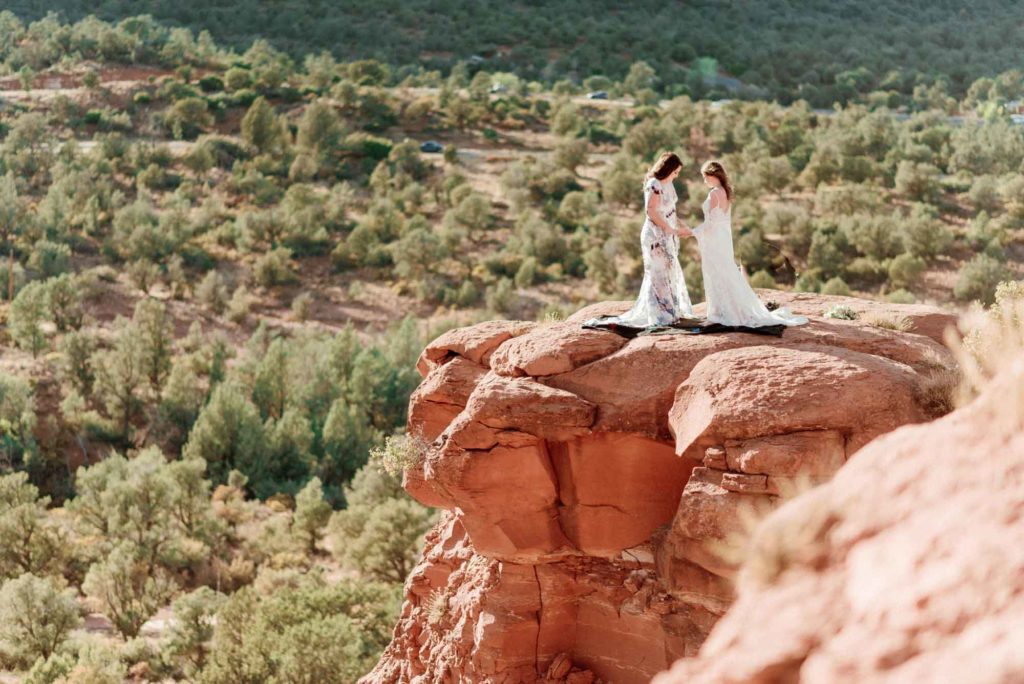 Elopement inspiration in Sedona, Arizona with flowy gowns and jaw-dropping views | Xsperience Photography | Featured on Equally Wed, the leading LGBTQ+ wedding magazine