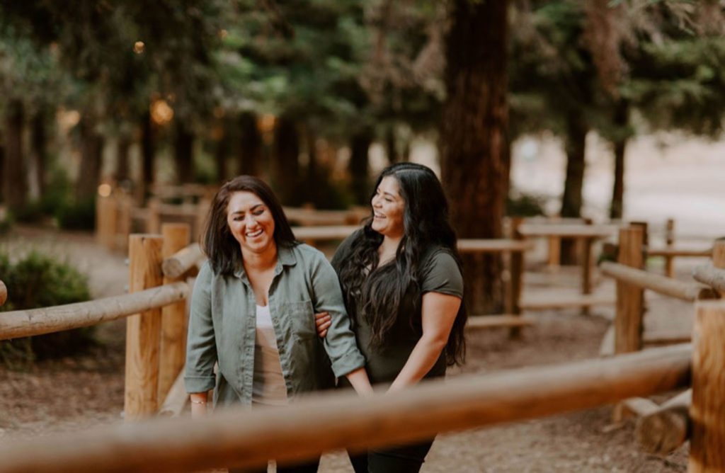 Joyful engagement session among redwood trees at California's Carbon Canyon | Kate Garcia Weddings | Featured on Equally Wed, the leading LGBTQ+ wedding magazine