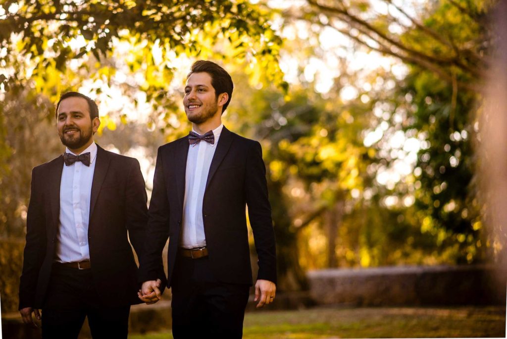 Laid-back, rustic abbey elopement with flower crown and blue suit | Joanne Lawrence Photography | Featured on Equally Wed, the leading LGBTQ+ wedding magazine