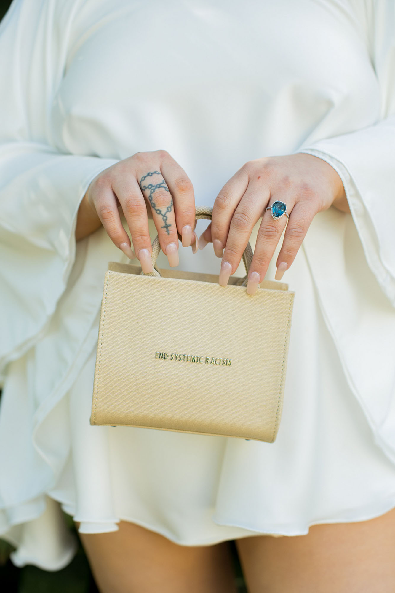 Sunny South Carolina elopement surrounded by greenery | Jessica Hunt Photography | Featured on Equally Wed, the leading LGBTQ+ wedding magazine - purse, statement