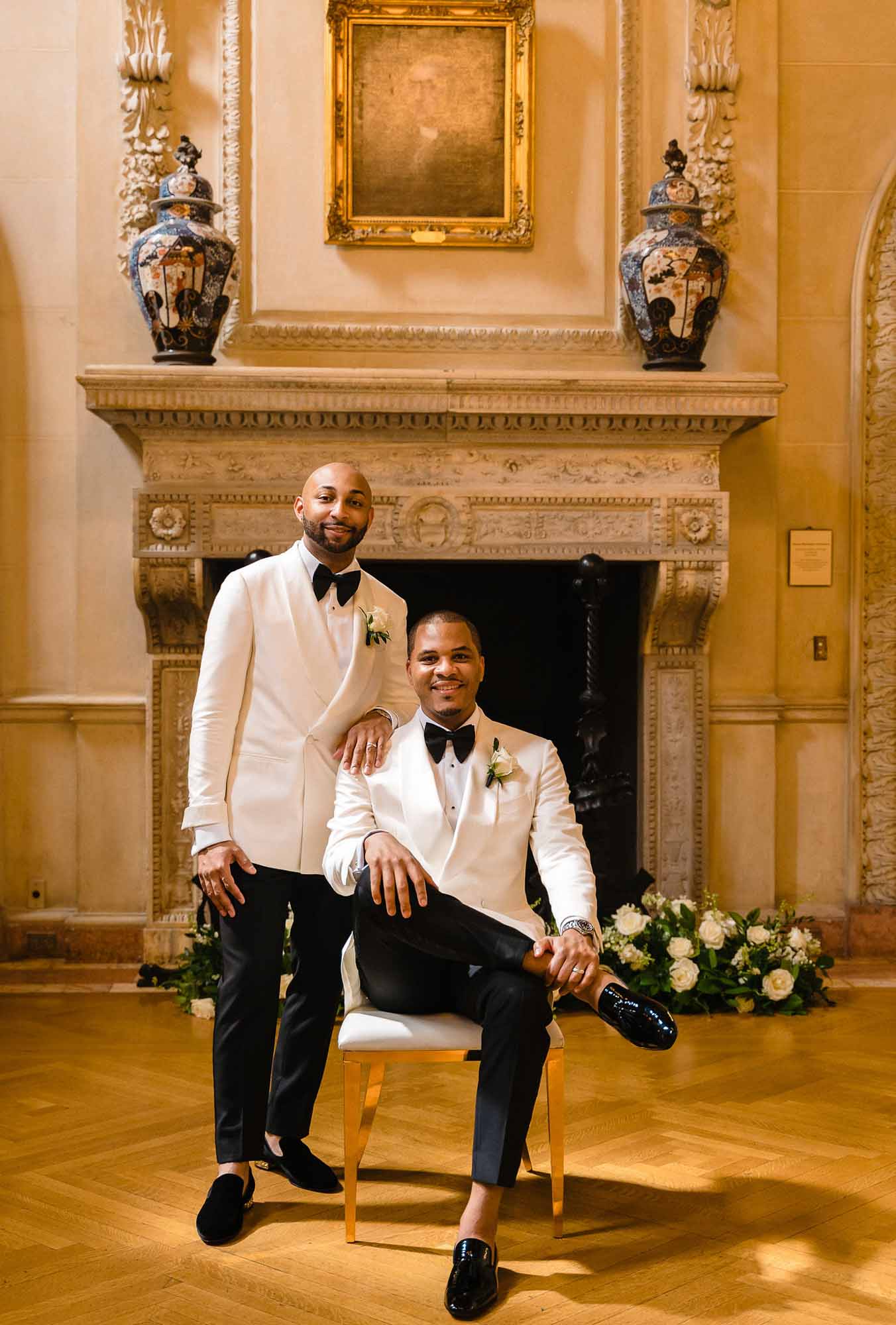 This couple transformed their home into a fabulous wedding venue | Myron Fields Photography | Featured on Equally Wed, the leading LGBTQ+ wedding magazine - grooms, white tuxedo