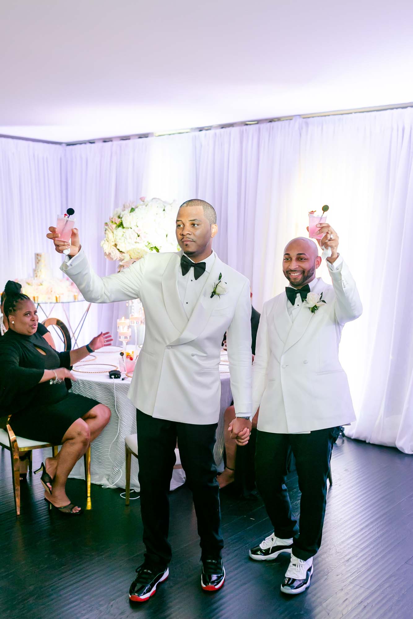 This couple transformed their home into a fabulous wedding venue | Sarandipity Photography | Featured on Equally Wed, the leading LGBTQ+ wedding magazine - grooms, white tuxedo