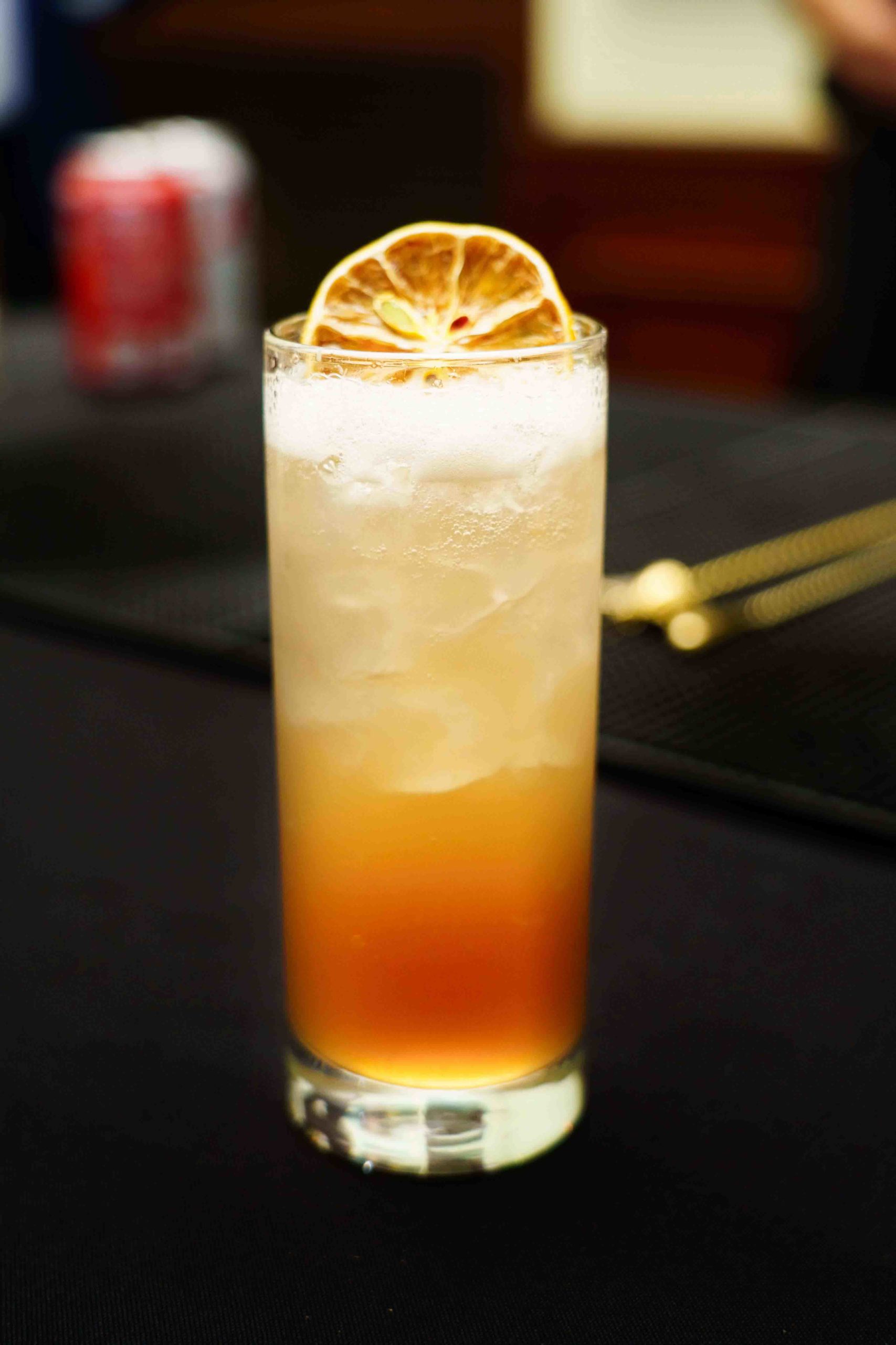 orange cocktail with dehydrated orange