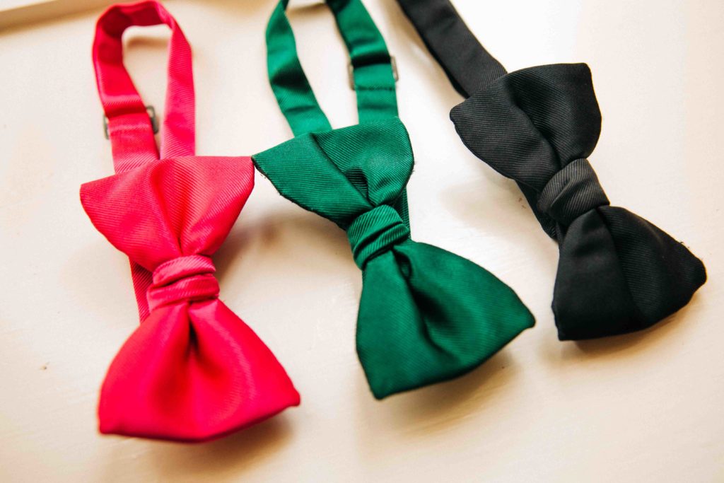 red, green and black bow ties