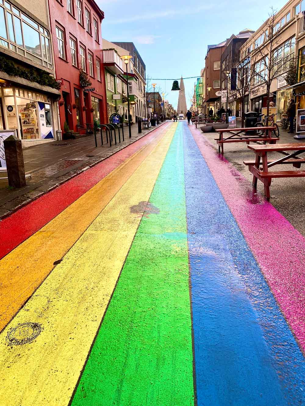 LGBTQ+ pride rainbow painted on street in Reykjavík