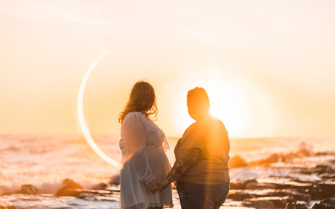 Sunrise engagement session on the beach of Asbury Park, New Jersey