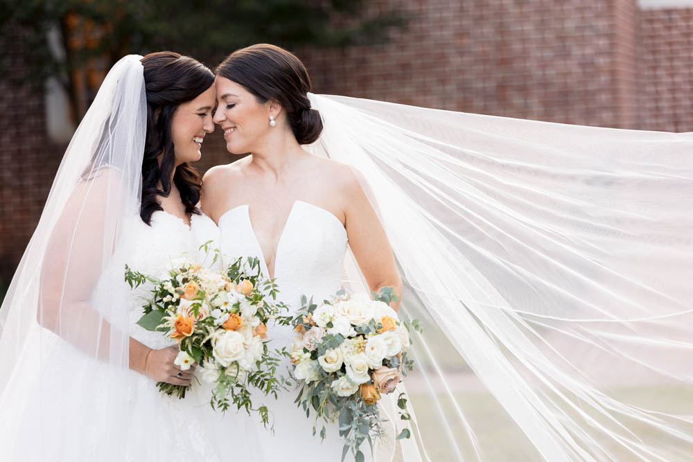 Sentimental Elements Shine For These Two Brides’ Virginia Beach Wedding Featuring Bourbon, Rainbows and a Plethora of Family Support