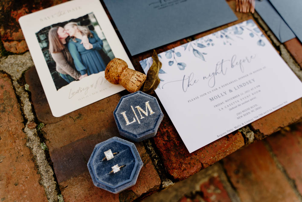 wedding stationery with shades of blue for two brides