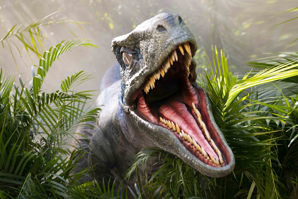 a dinosaur opens its mouth and roars menacingly