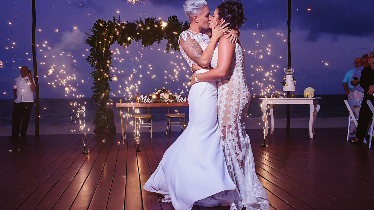 A destination wedding in Mexico with cold fireworks and an LED neon drum show