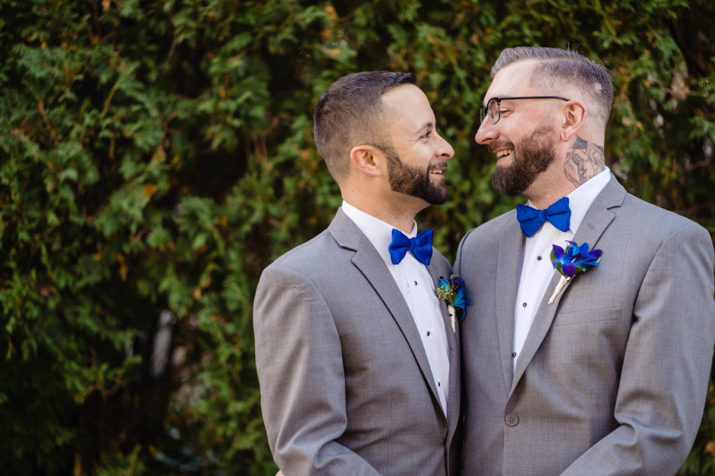 This fall wedding featured royal blue accents and matching suits for ...