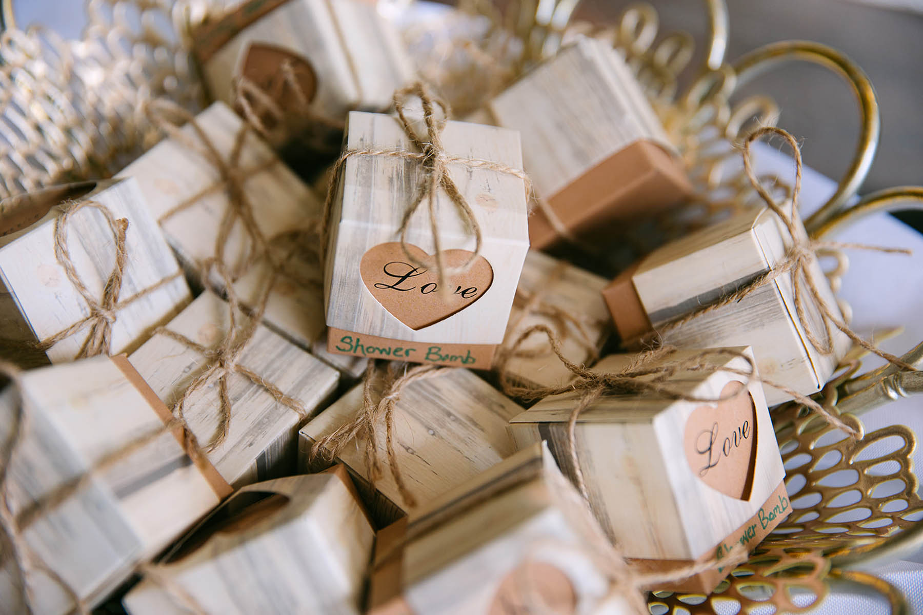 A basket of small, personalized boxes that say "love."