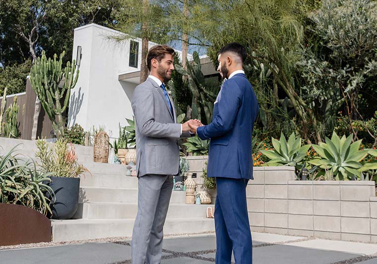 Two grooms in Generation Tux suits and tuxedos