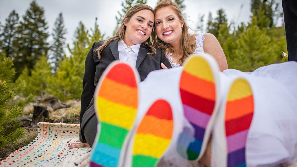 A destination mountain wedding in Breckenridge, Colorado, with a rainbow cake