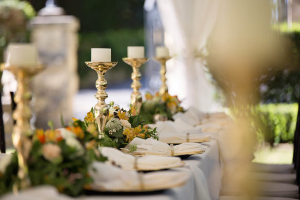 A wedding table spread with candlesticks