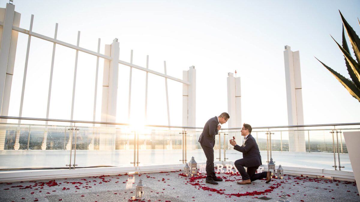 After six years of long distance, this gay couple got engaged in a modern penthouse summer proposal in Las Vegas