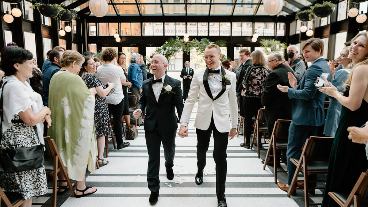 An elegant gay wedding for theater-loving grooms, inspired by Old Hollywood, Motown and a luxe jungle aesthetic